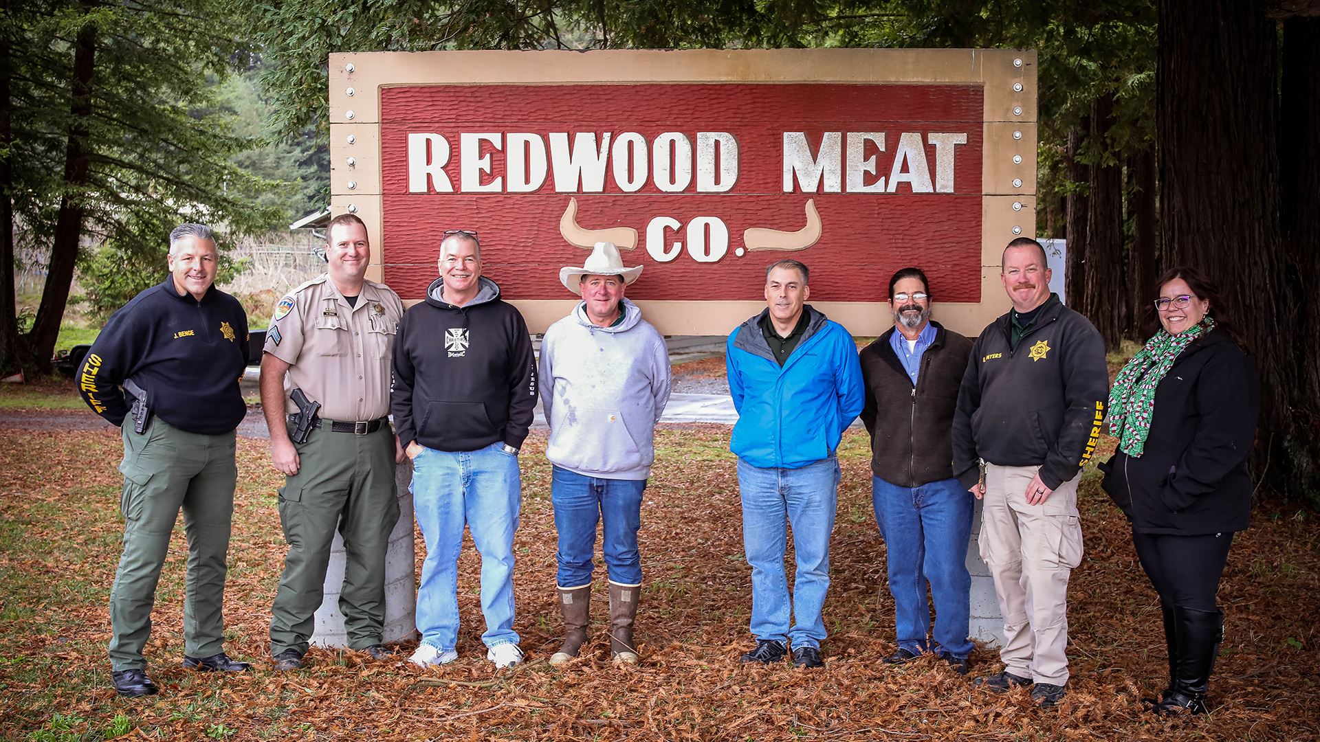 Group photo in front of the Redwood Meat Company Sign