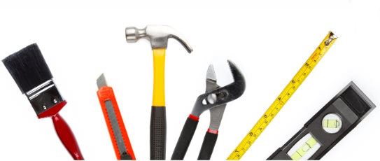 An array of simple tools, such as a paintbrush, hammer, and level, symbolize the tool library.