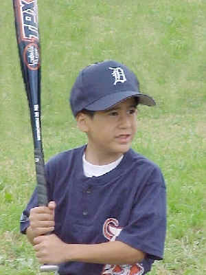 A young boy playing basketball
