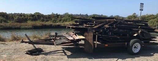abandoned trailer with garbage
