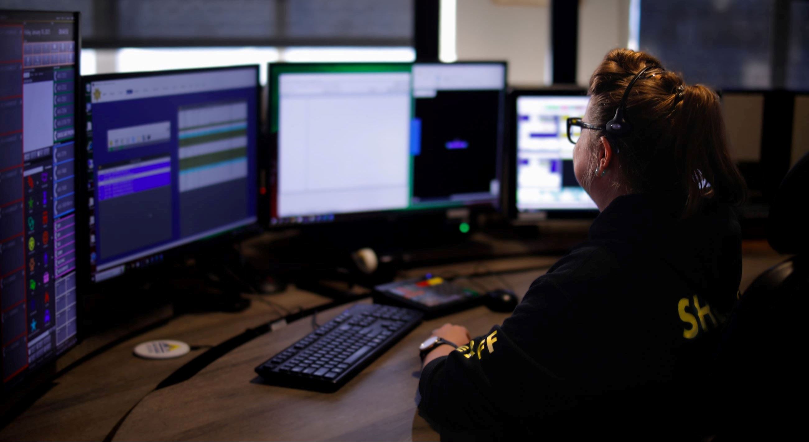 Dispatcher working in the HCSO Emergency Communications Center