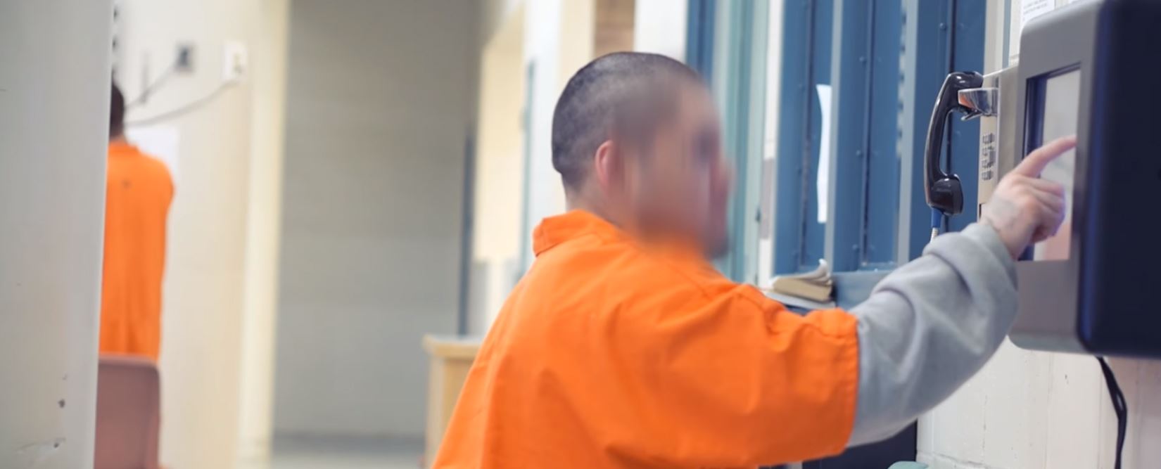 Photo of inmate using the phone