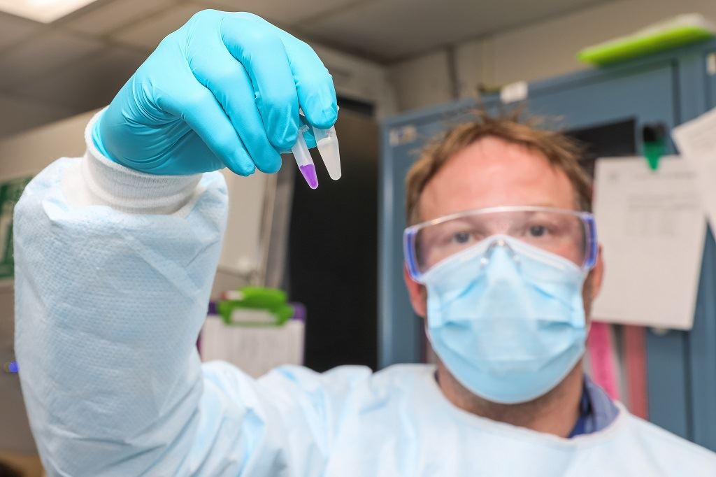 Humboldt County Lab Manager Jeremy Corrigan displays the reagents